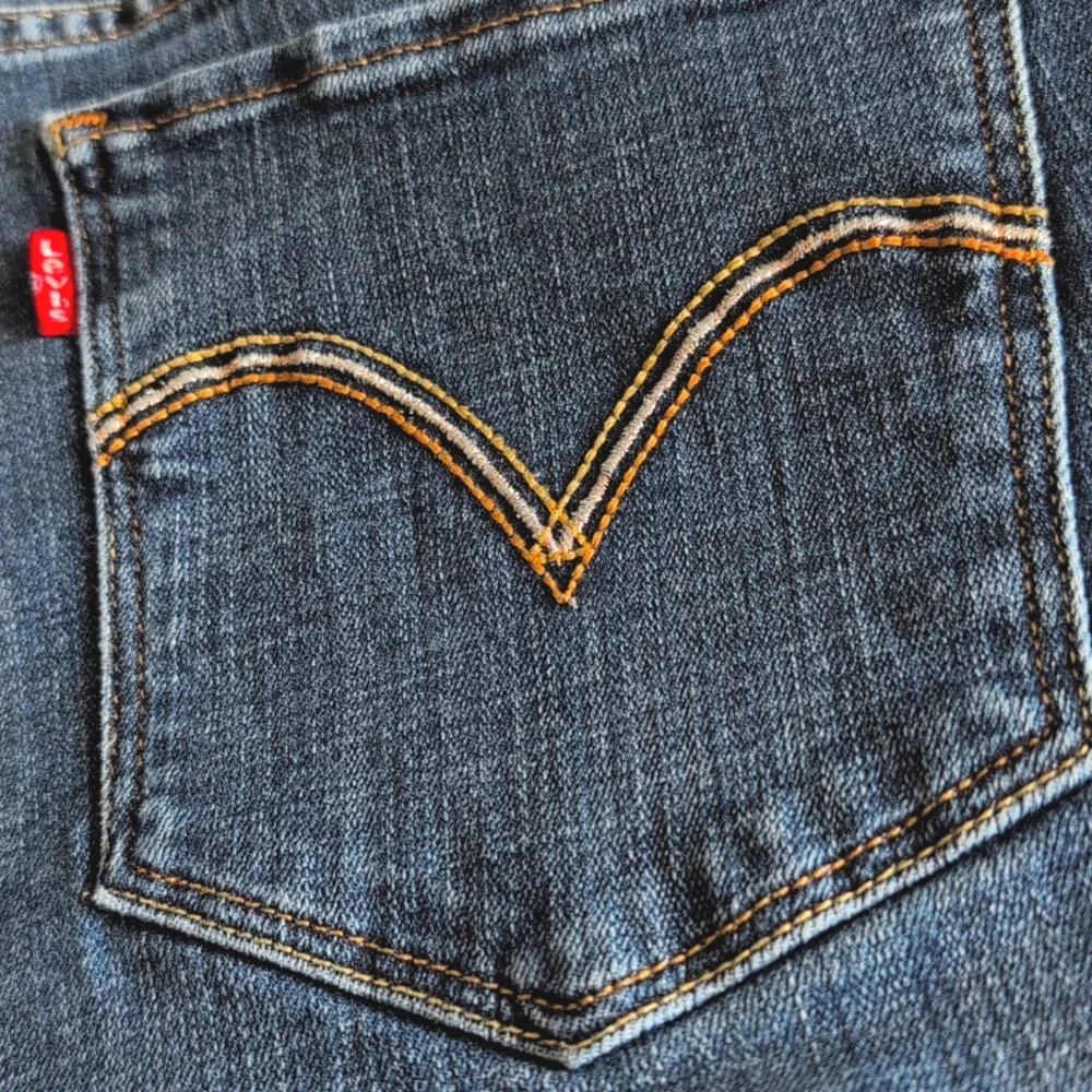 Levi Strauss & Co. Original Riveted Classic Boot blue jeans. 16S 33 x 30